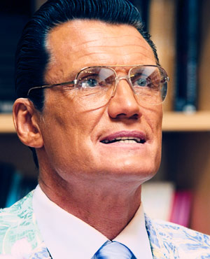 Dr. Sage Mennox played by Dolph Lundgren in Small Apartments