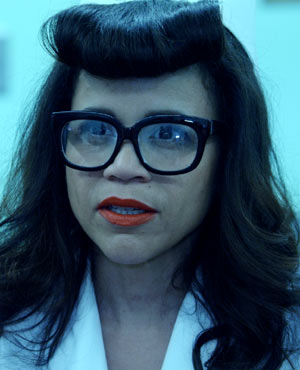 Mrs Baker played by Rosie Perez in Small Apartments