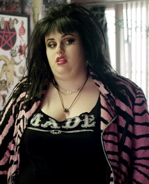 Rocky played by Rebel Wilson in Small Apartments