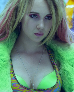 Simone played by Juno Temple in Small Apartments