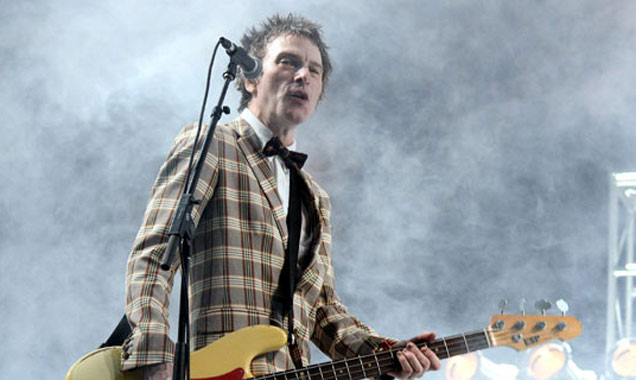 Tommy Stinson of The Replacements performs onstage during day 1 of the 2014 Coachella Valley Music & Arts Festival