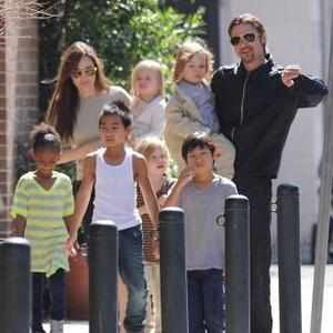 Brad And Angelina With Their Children picture