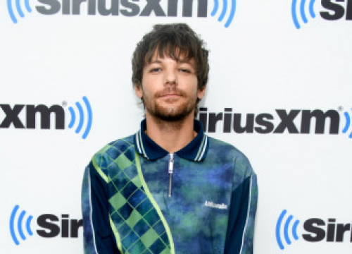 Louis Tomlinson Compared Himself To His One Direction Bandmates For 'A Long Time'