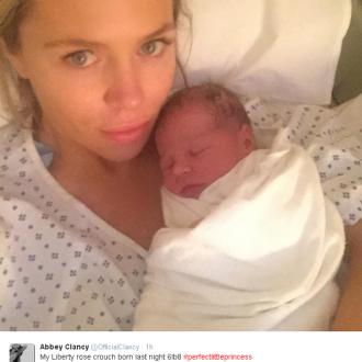 Abbey Clancy gives birth to daughter 