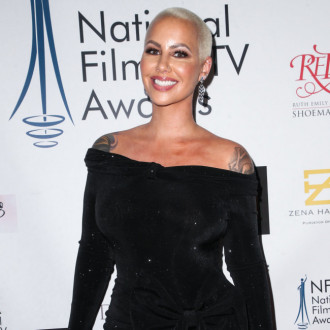 Amber Rose insists she and Chris Rock are just 'good friends' following dating rumour