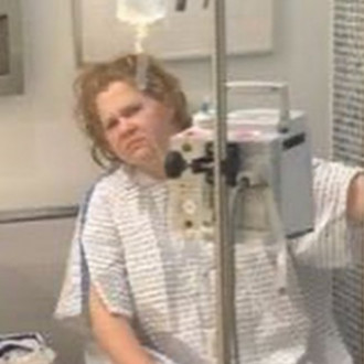 Amy Schumer posts image of herself hooked to an IV drip to warn women in 20s: “Life is coming for you b******!’