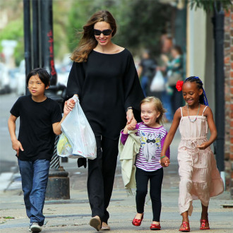New home amid Brad battle! Angelina Jolie spotted apartment hunting in New York with her kids