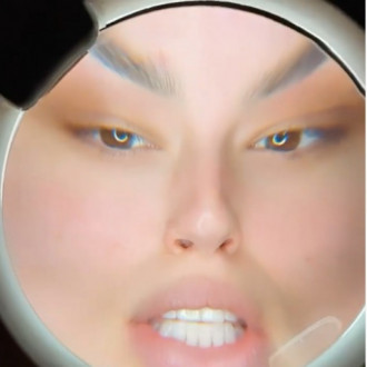 Ashley Graham shows fans what her skin looks like under a magnifying glass