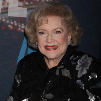 Betty White treats herself to vodka martini and french fries