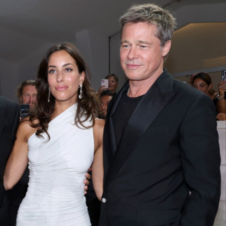 Brad Pitt and Ines de Ramon make their red carpet debut after two years of dating