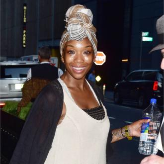 Brandy snuck backstage at a Whitney Houston concert as a teen
