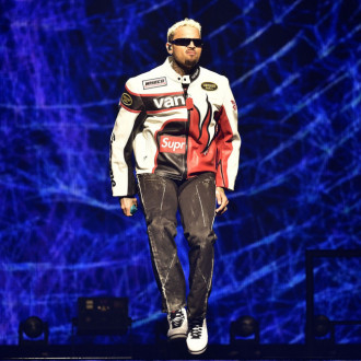 Chris Brown left dangling mid-air as gig stunt goes wrong