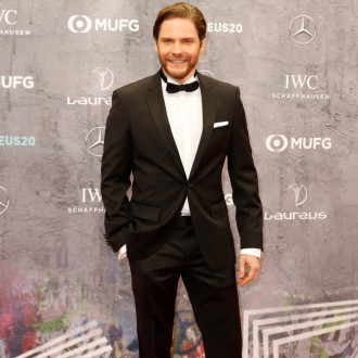 Daniel Bruhl hails 'clever and charming' Karl Lagerfeld