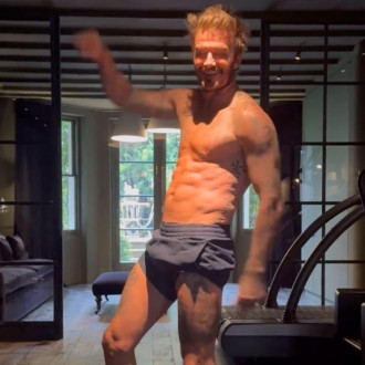 David Beckham’s wife marks his 49th birthday by posting clip of his six-pack!