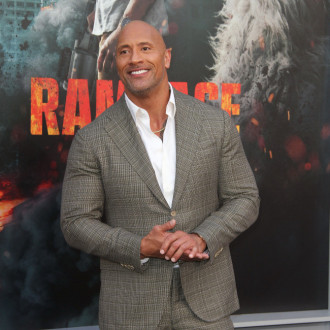Dwayne Johnson remembers childhood dreams of becoming a country star as he tears up over late father