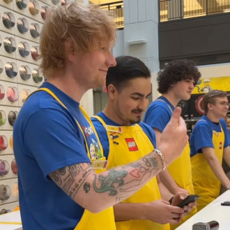 Ed Sheeran puts in a shift at LEGO store