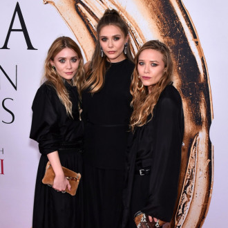 Elizabeth Olsen reflects on childhood with famous sisters Mary-Kate and Ashley: 'I stayed at home!'