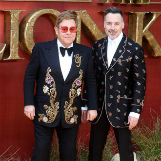 Elton John kept cardboard cut-outs of husband and sons in dressing room