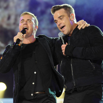 Gary Barlow speaks to Robbie Williams 'most days'