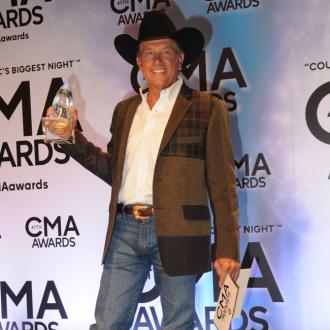 George Strait named triumphs at CMAs