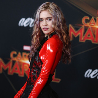 Grimes sues Elon Musk for parental rights