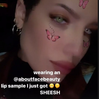 Halsey teases potential new lipstick shade for about-face