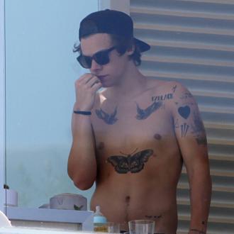 Harry Styles Finds New Tattoo Parlour