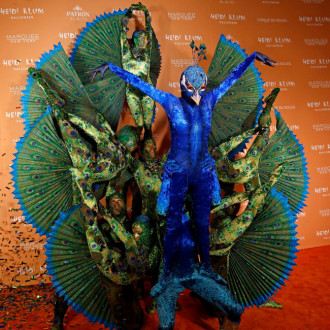Heidi Klum's took six hours and 10 Cirque Du Soleil dancers to create epic Halloween costume