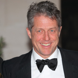 Plumber who was given £75,000 by Hugh Grant at centre of race-row