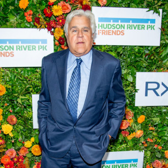 Jay Leno's friend leaped on top of him to smother the fire during horror accident