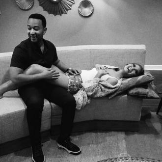 Chrissy Teigen and John Legend expecting first child