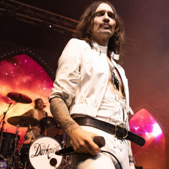 Justin Hawkins left 'limping' after doing David Lee Roth-style split stage jump