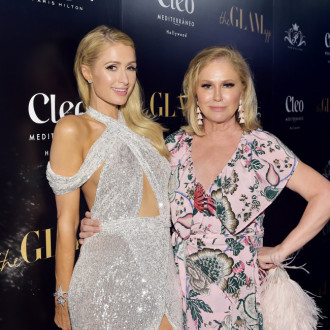 Kathy Hilton had to teach Paris Hilton how to change a diaper: 'She's learning little by little!'