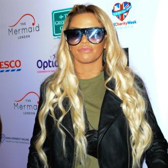 Katie Price's mucky mansion on fire - again