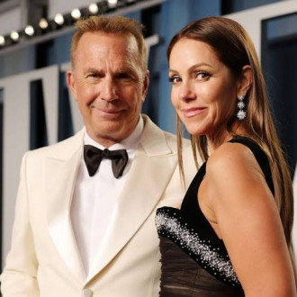 Downsizing! Kevin Costner’s estranged wife seen lugging boxes of clothes and shoes into storage unit after being booted from $145m home