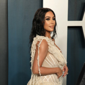 Kim Kardashian 'wants to include Kanye West in her kids' lives'