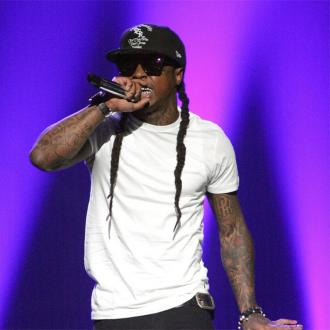 Lil Wayne storms off stage over booze