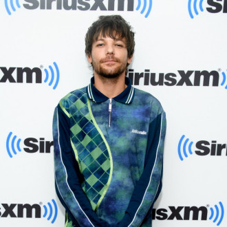 Louis Tomlinson compared himself to his One Direction bandmates for 'a long time'