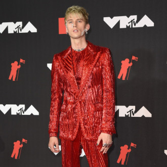 Machine Gun Kelly hopes aliens will use his nail polishes one day