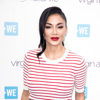 Nicole Scherzinger and Pussycat Dolls founder settle legal battle