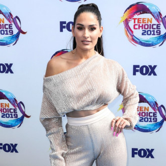 Nikki Bella chose her wedding dress on the day she tied the knot