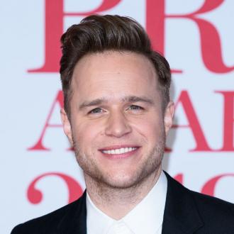 Olly Murs is 'so happy' in his relationship