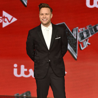 Olly Murs is still in touch with Caroline Flack's family