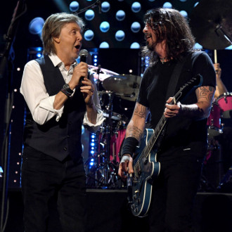 Sir Paul McCartney performs with Foo Fighters after Rock & Roll Hall of Fame induction