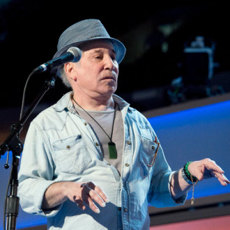'I haven’t figured out how to perform with hearing loss!' Paul Simon is certain he's done with touring