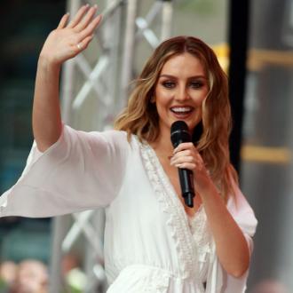 Perrie Edwards loves single life