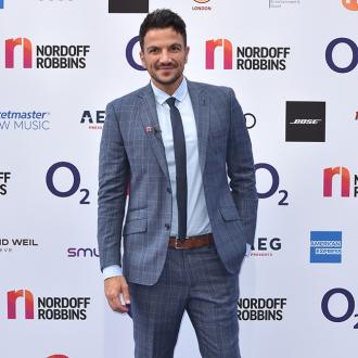 Peter Andre in no rush to get his abs back: 'I'll sacrifice my six-pack for choccies any day'