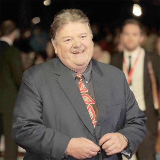Robbie Coltrane’s son pays witty tribute to late comic dad by posting: ‘Just woke up what did I miss?’