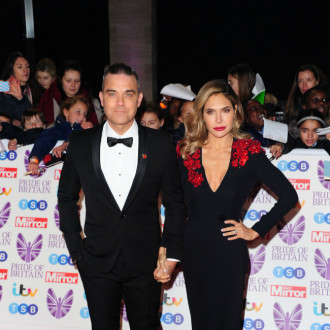 Ayda Field and Robbie Williams can find it 'challenging' getting time away from kids