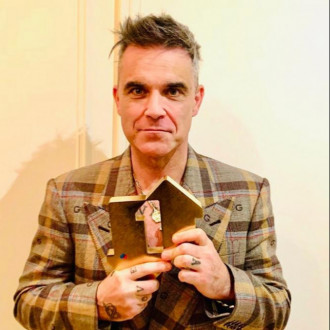 Robbie Williams breaks chart record previously held by Elvis Presley